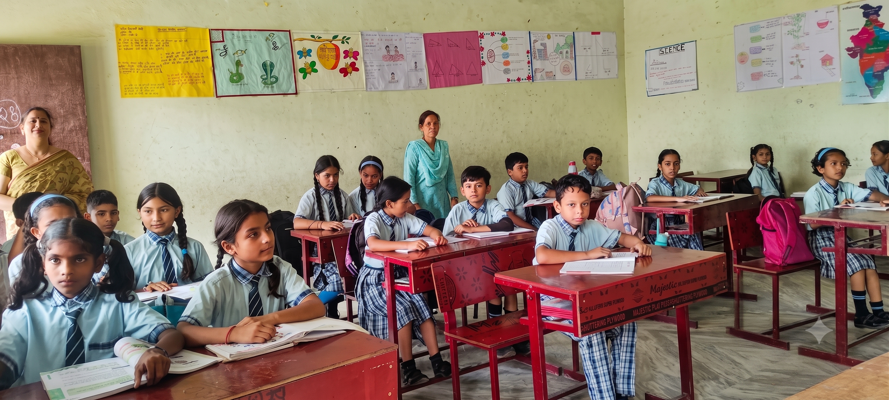 Teacher helping students in a bright classroom